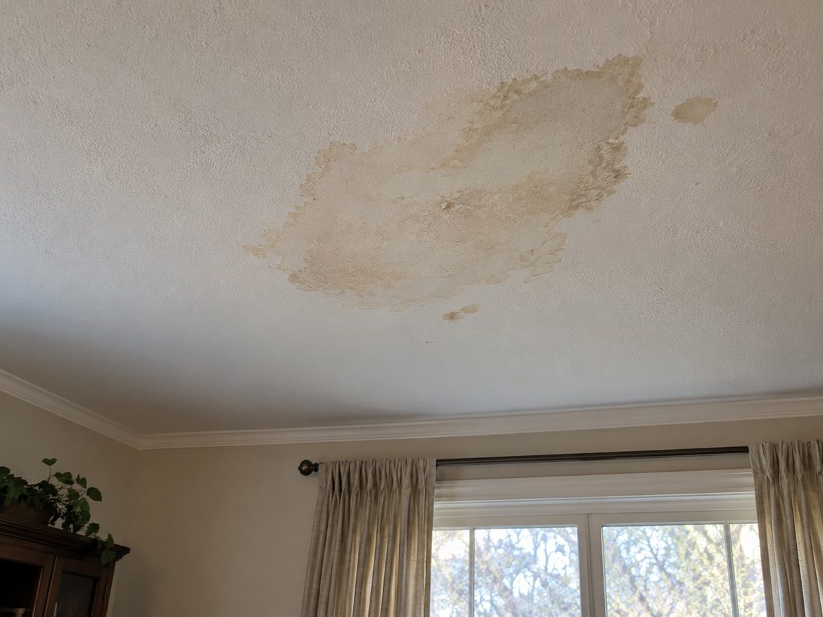 Ceiling with localised water staining